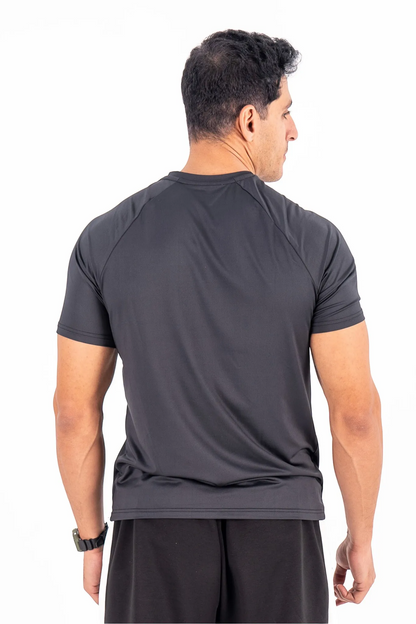 BEASTR black polyester performance tee with athletic fit and raglan sleeves for men.